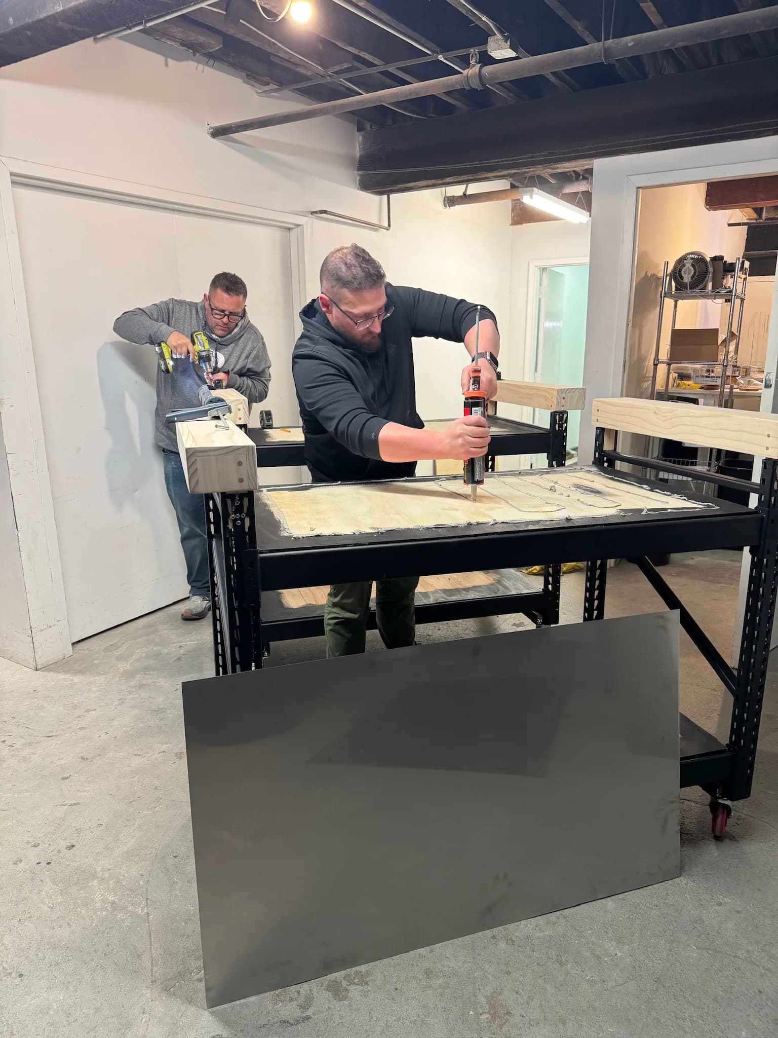 Corner Coffee team building and fitting a custom mobile coffee cart in the workshop