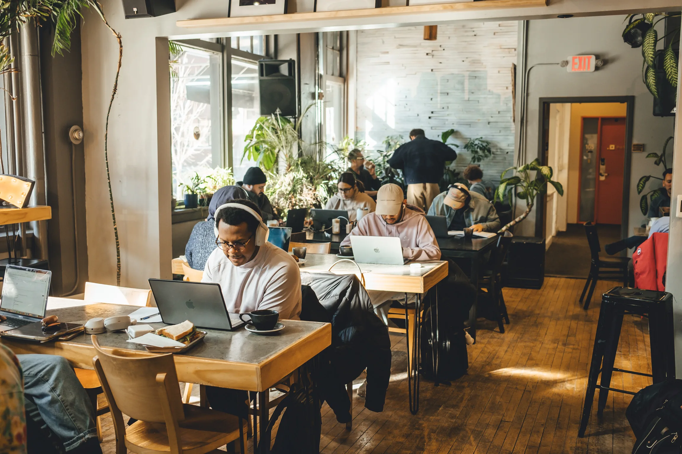 Corner Coffee North Loop cafe filled with guests working and gathering